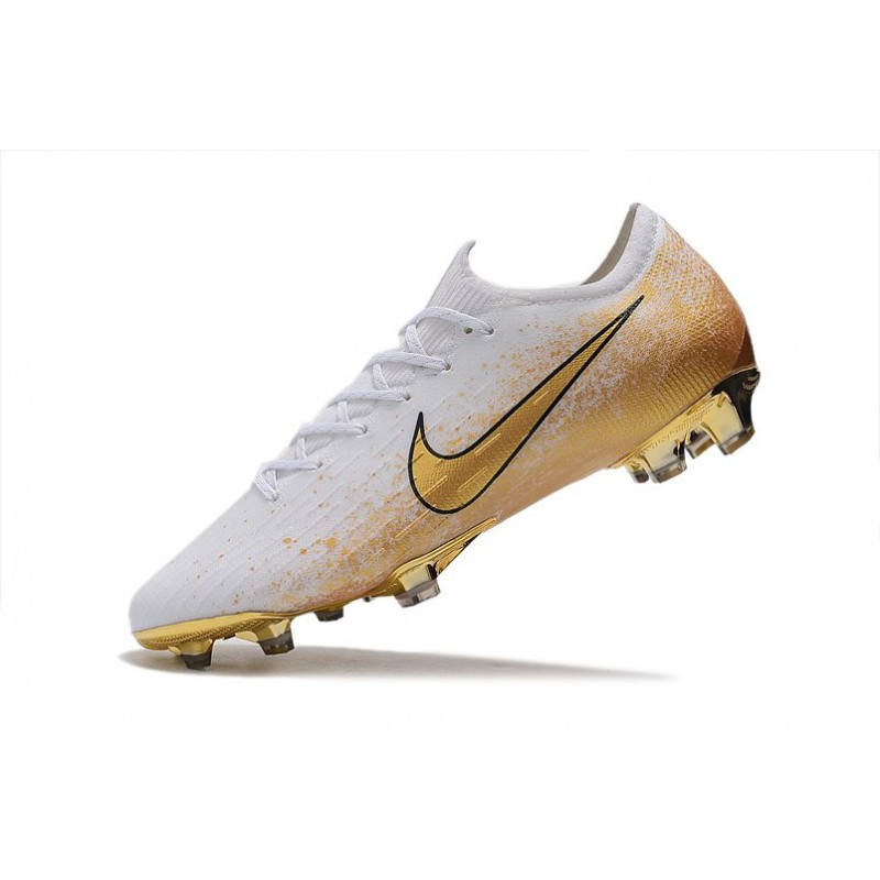 white and gold nike vapor cleats